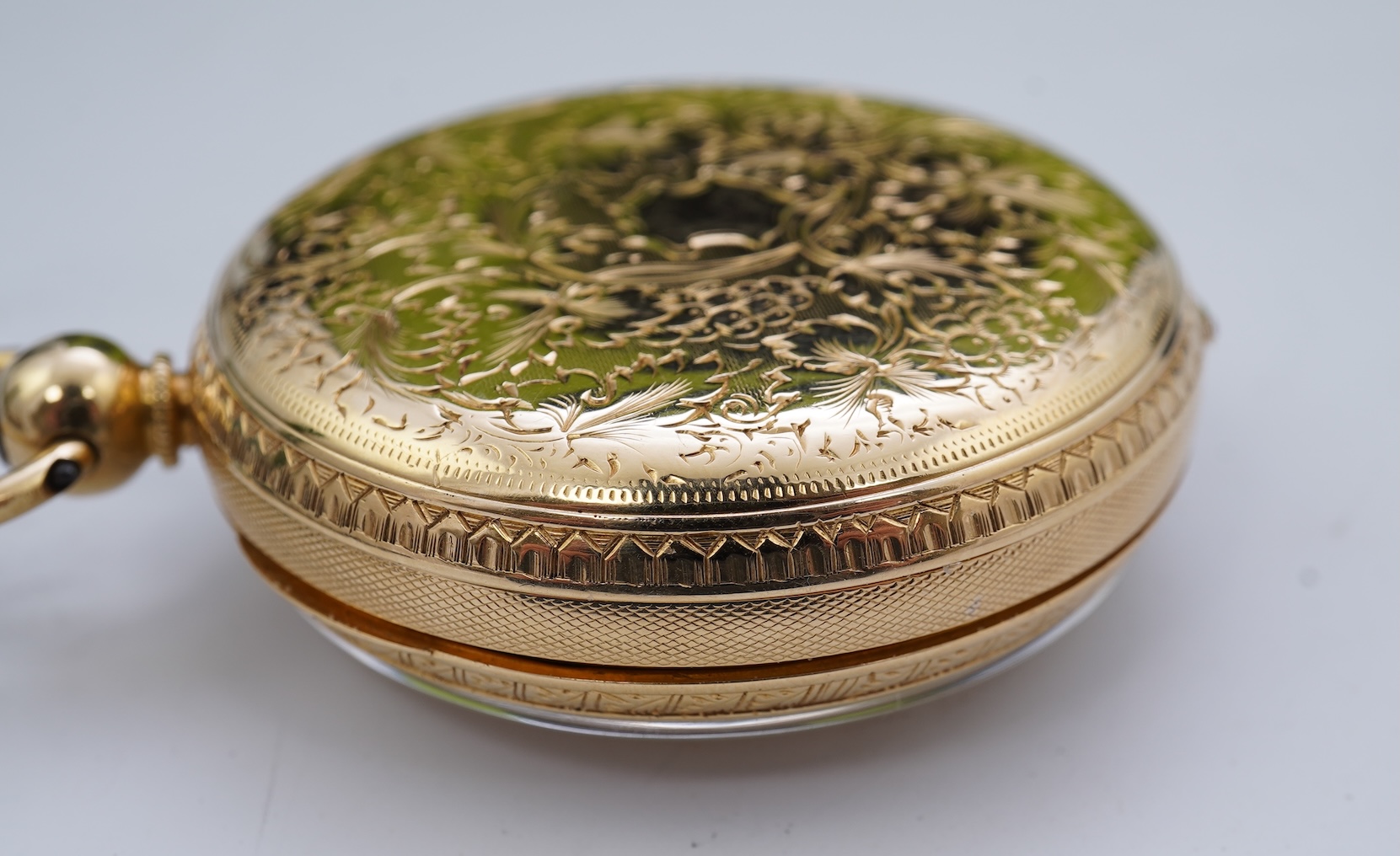 A Victorian engraved 18ct gold open faced key wind pocket watch